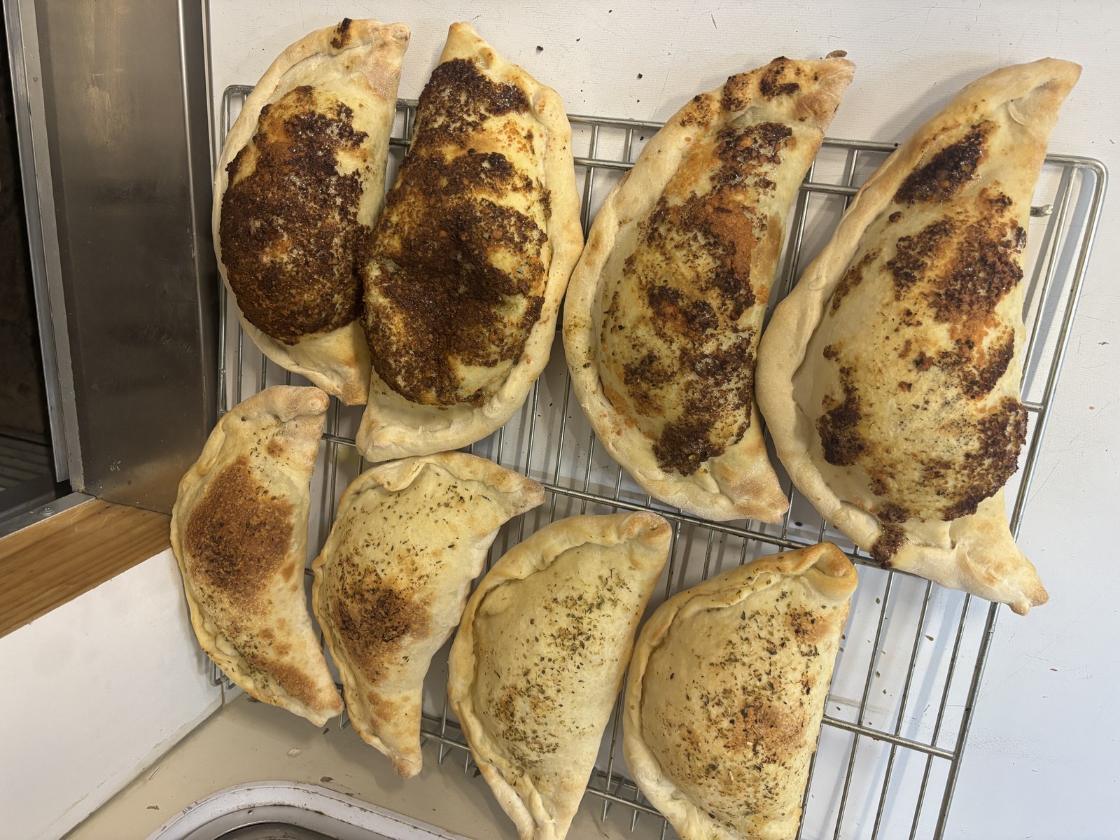 Fresh baked calzoncini pizza pockets