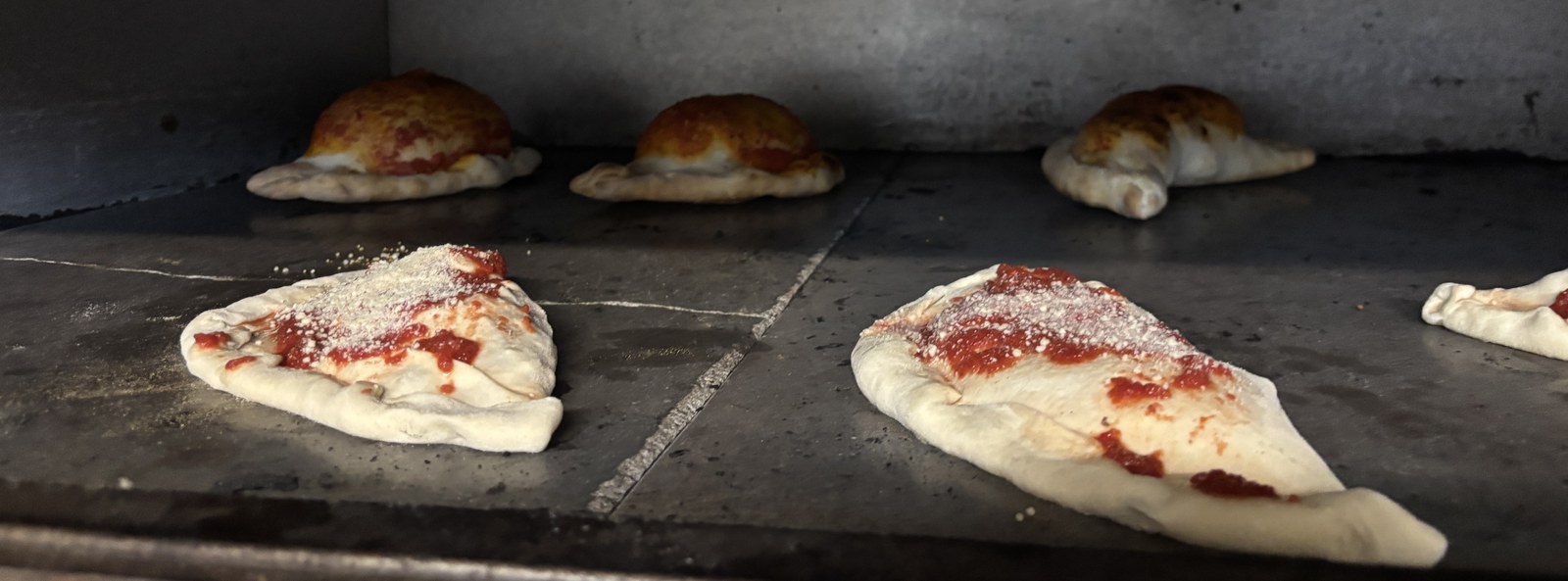 Calzoncini baking in the oven